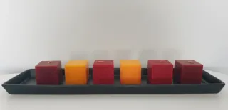 Portacandele con 6 candele quadrate