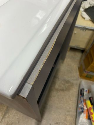 Mueble de baño con lavabo gris