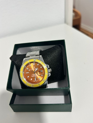 Reloj oyster perpetual Naranja y Amarillo