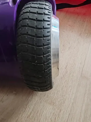 Hoverboard Morado con Bolsa Roja y cargador.