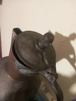 Tetera antigua de cobre