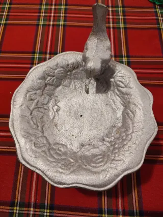 Svuota tasche in metallo con uccellino