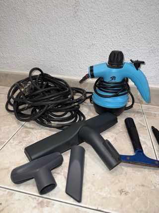 Vaporeta de mano azul con accesorios