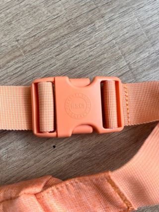 Riñonera sin estrenar HERSCHEL color salmón