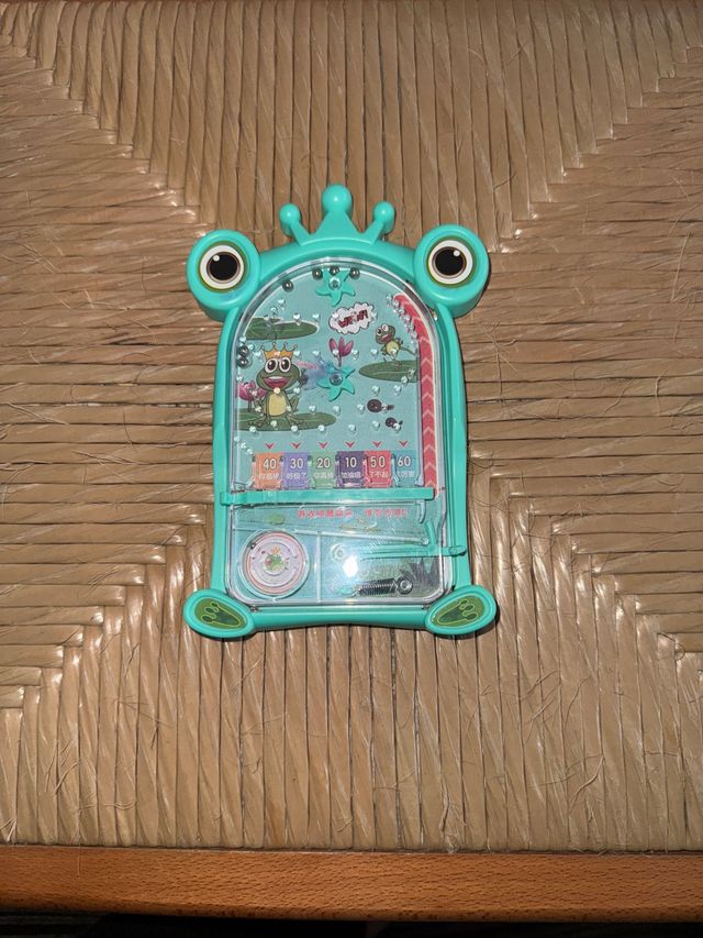 Juguete infantil tipo pinball de rana