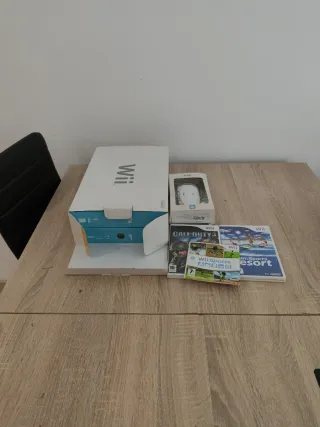 Nintendo Wii como nueva + 3 Juegos + Mando