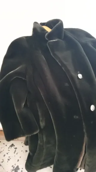 Pelliccia grigio e bianca