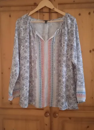 Blusa estampada manga larga