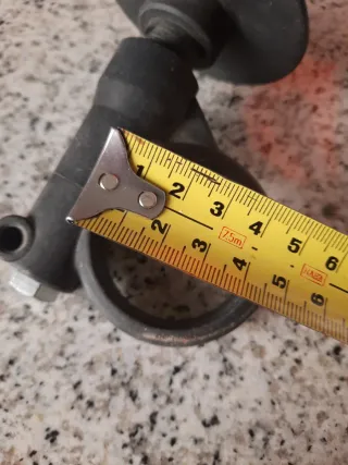 Empuñadura para taladro, ajustable con el puño