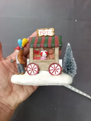 Escena Navideña con Tienda de Juguetes