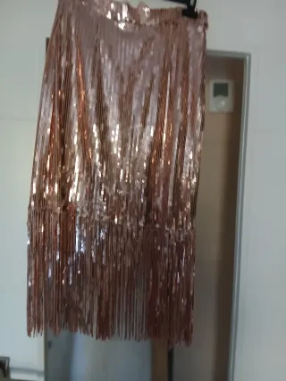 Falda dorada lentejuelas con flecos