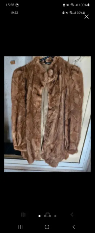 Abrigo de piel marrón