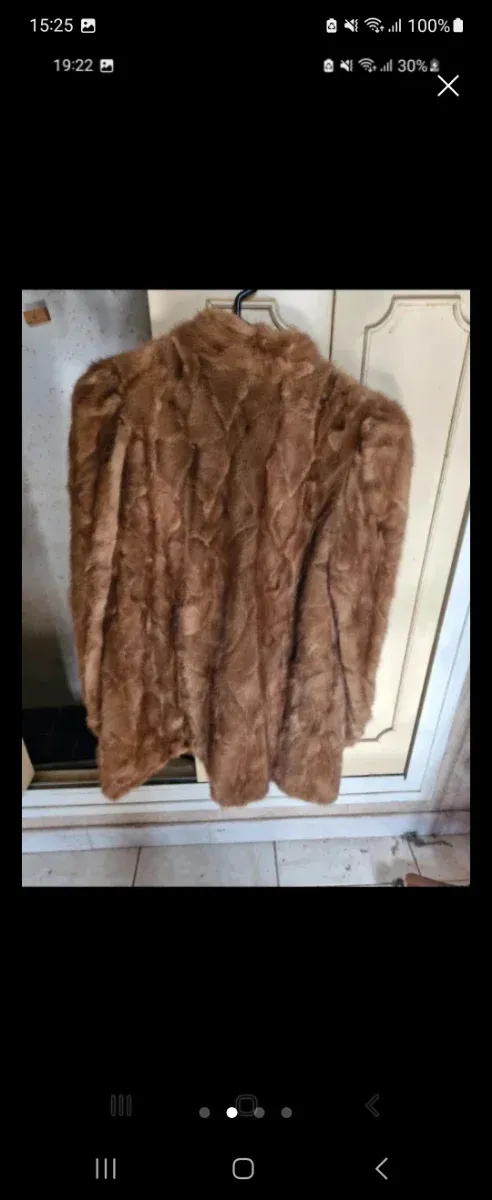 Abrigo de piel marrón