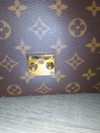 Bolso Louis Vuitton Marrón y Rojo original.