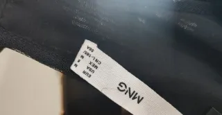 Vestido fiesta negro con flecos Mango lentejuelas