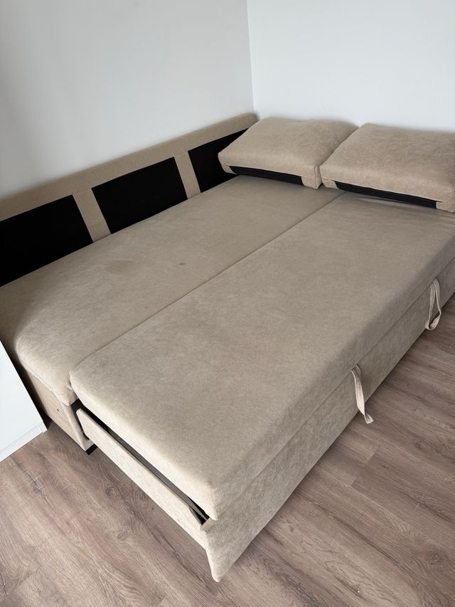 Sofá cama beige de tela