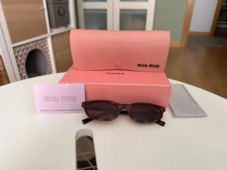 Gafas de sol miu miu en perfecto estado