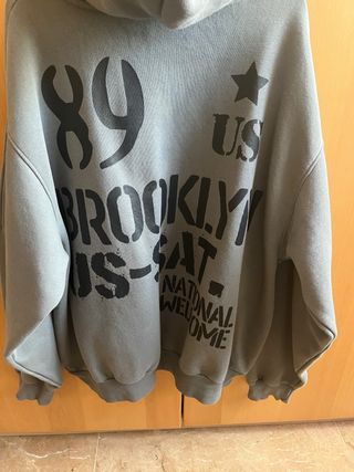 Sudadera verde con estampado New York