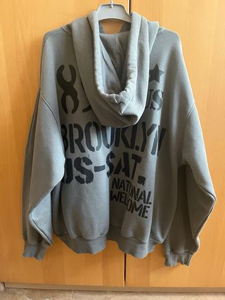 Sudadera verde con estampado New York