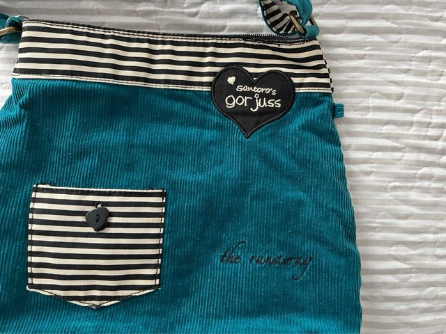 Bolso bandolera azul con rayas Gorjuss.