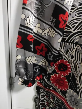Blusón fiesta estampado talla 46