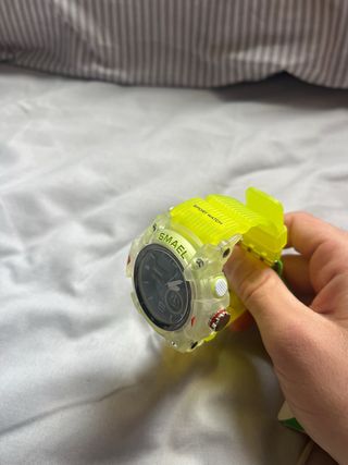 Reloj  Amarillo y blanco