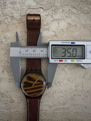 Reloj Swatch Marrón y Amarillo