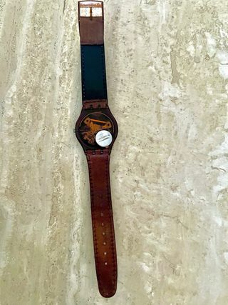Reloj Swatch Marrón y Amarillo