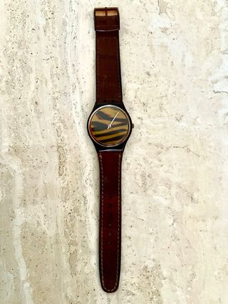 Reloj Swatch Marrón y Amarillo