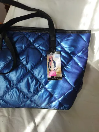 Borsa donna trapuntata con cartellino