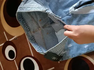 Pantalón vaquero flare desgastado