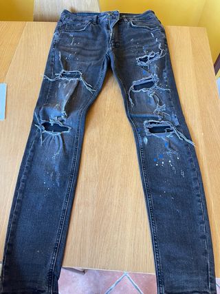 Vaqueros negros hombre rotos y pintados