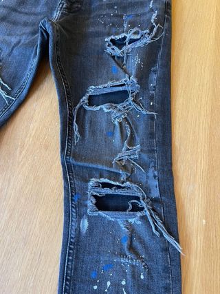 Vaqueros negros hombre rotos y pintados