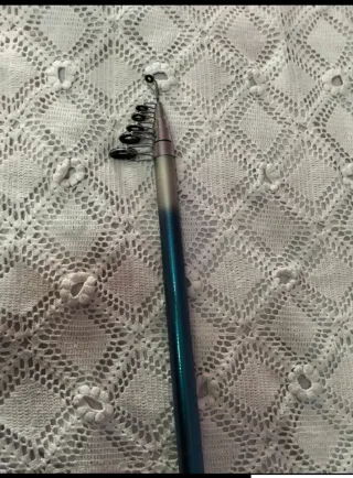 Caña de pesca con carrete