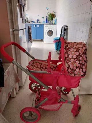 Carrito de juguete rosa con flores nuevo