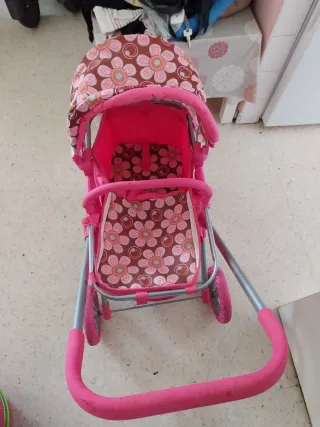 Carrito de juguete rosa con flores nuevo