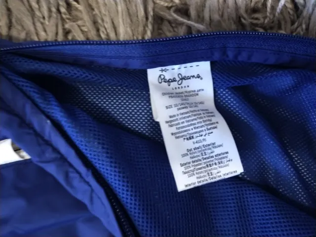 Cortavientos Pepe Jeans niño azul y blanco