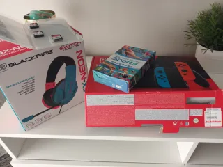 Nintendo Switch + Cuffie + Giochi