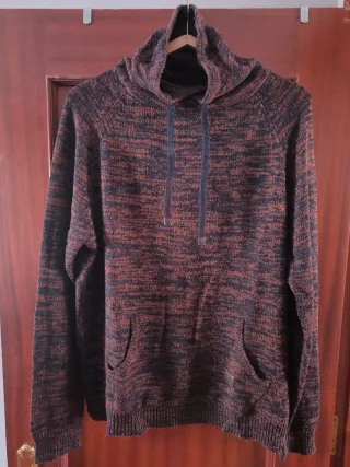 Jersey marrón y negro de punto con bolsillos