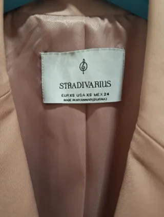 Chaqueta rosa con cinturón