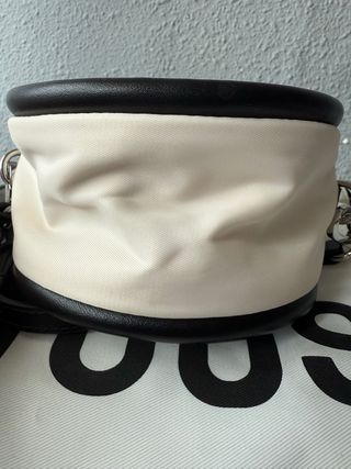 Bolso Tous redondo beige y negro