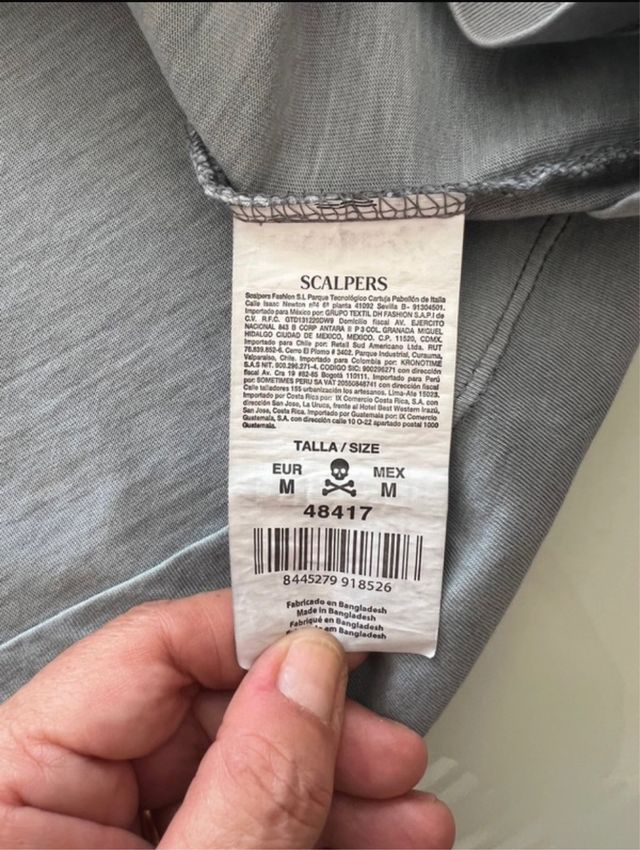 Camiseta Scalpers azul grisáceo Como nueva