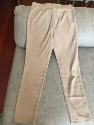 Pantaloni in pelle pesca beige