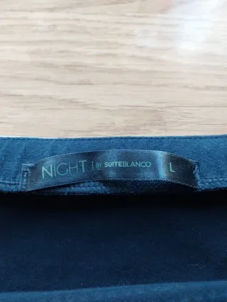 Minifalda negra con tachuelas plateadas Blanco