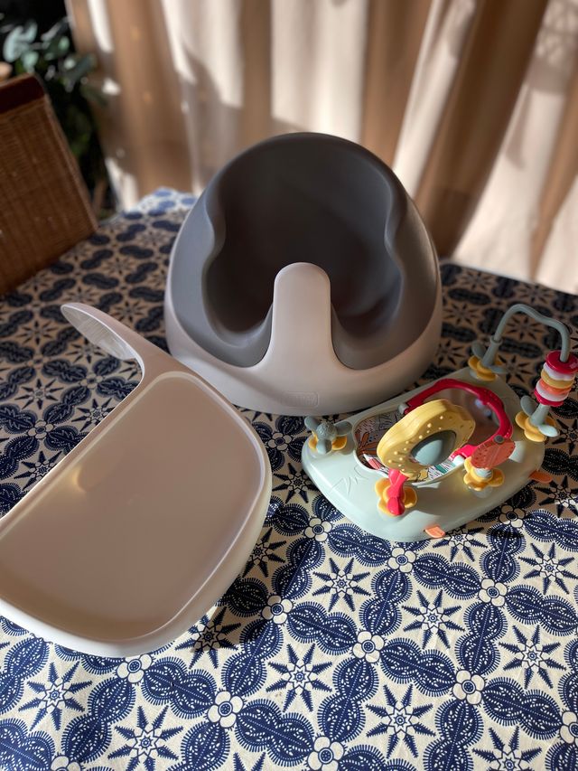 Asiento bebé con juguetes