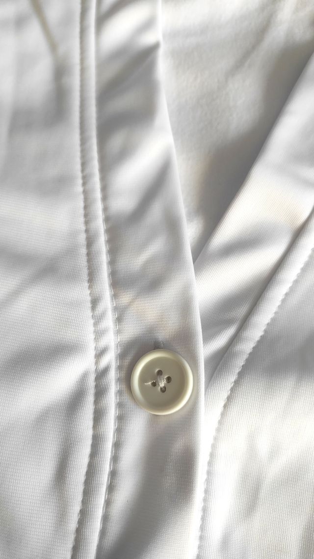 Chaqueta blanca acetato con botones