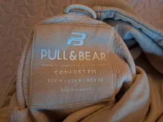 Sudadera beige con capucha