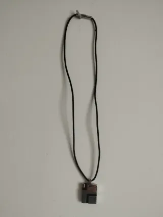 Colgante Acero Hombre de caucho Negro y Plateado