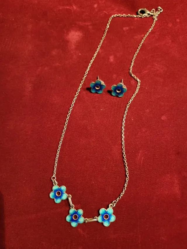 Set di gioielli con fiore blu