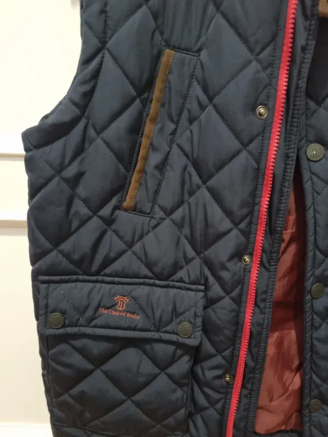 Chaleco Time of Boccha azul y marrón